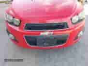 2015 Chevrolet Sonic LTZ z VIN 1G1JE6SB5F4130115, wystawiony jako IAAI lot #43557075 z przebiegiem 139 982 mil mil oraz . Historia ofert i sprzedaży dostępna na DreamBid. Obrazek 12.