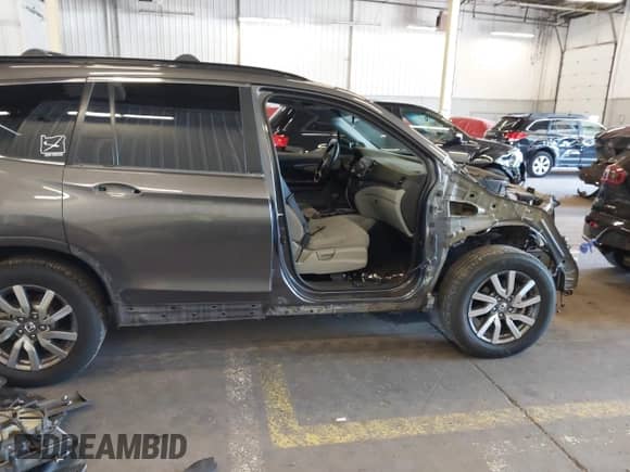 2020 Honda Pilot EX с VIN 5FNYF6H35LB065497, выставлен на аукционе IAAI как лот 42648826 с пробегом 68 504 миль миль и . История ставок и продаж доступна на DreamBid. Изображение 14.