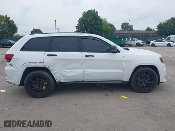 2019 Jeep Grand Cherokee SRT with VIN 1C4RJFDJ3KC768504, listed as a IAAI auction lot 42926501 with 43,000 mi miles and . Bid and sale history available at DreamBid. Image 12.