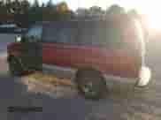 2000 Chevrolet Astro with VIN 1GNDM19W6YB180580, listed as a Copart auction lot 77676494 with 413,650 mi miles and Salvage title. Bid and sale history available at DreamBid. Image 2.