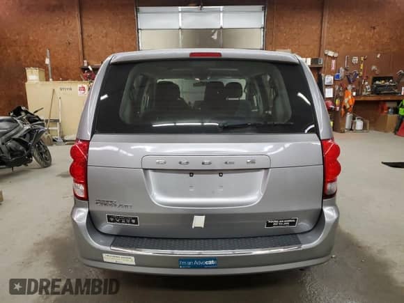 2014 Dodge Grand Caravan SE 30th Anniversary with VIN 2C4RDGBG9ER175620, listed as a Copart auction lot 80494495 with 119,440 mi miles and Salvage title. Bid and sale history available at DreamBid. Image 6.