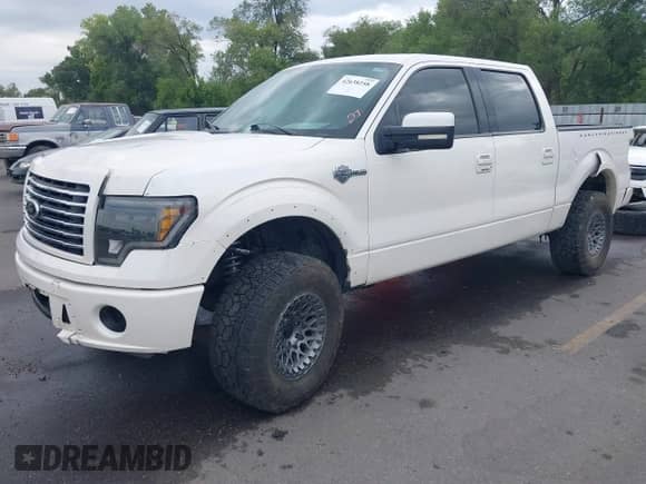 2012 Ford F-150 Lariat with VIN 1FTFW1E68CFA21742, listed as a IAAI auction lot 42638258 with 148,415 mi miles and . Bid and sale history available at DreamBid. Image 23.