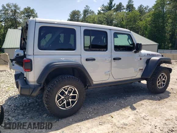 2024 Jeep Wrangler Rubicon with VIN 1C4PJXFG6RW334116, listed as a Copart auction lot 61608985 with 6,881 mi miles and Salvage title. Bid and sale history available at DreamBid. Image 3.