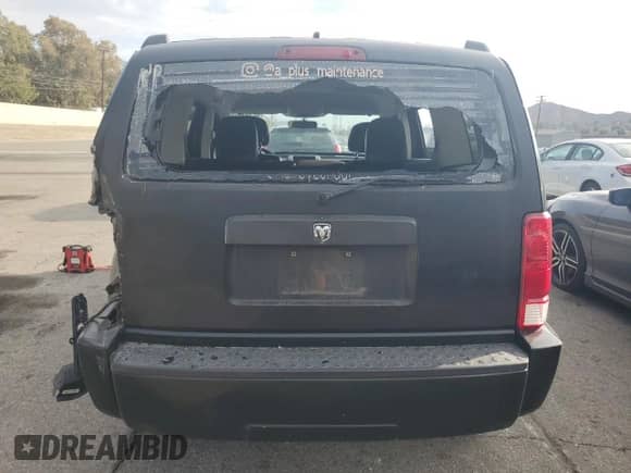 2011 Dodge Nitro Heat with VIN 1D4PT4GK8BW602815, listed as a Copart auction lot 82169005 with 126,700 mi miles and Salvage title. Bid and sale history available at DreamBid. Image 6.