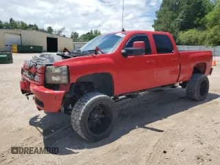 2013 Chevrolet Silverado 2500HD LT z VIN 1GC1KXC8XDF196413, wystawiony jako Copart lot #64407735 z przebiegiem 262 268 mil mil oraz Szkoda całkowita • Salvage title. Historia ofert i sprzedaży dostępna na DreamBid. Obrazek 1.