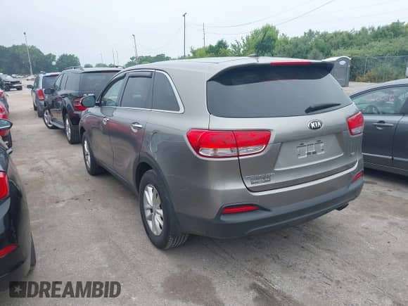 2017 Kia Sorento LX with VIN 5XYPG4A3XHG263967, listed as a IAAI auction lot 42673437 with 148,186 mi miles and . Bid and sale history available at DreamBid. Image 3.