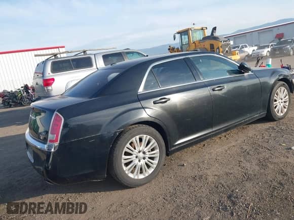 2013 Chrysler 300 with VIN 2C3CCARG5DH659840, listed as a IAAI auction lot 43548831 with 129,743 mi miles and . Bid and sale history available at DreamBid. Image 4.