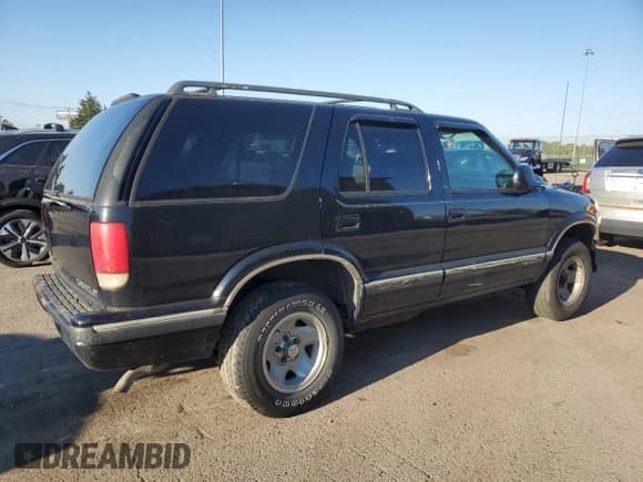 1997 Chevrolet Blazer LT with VIN 1GNCS13W1V2167774, listed as a Copart auction lot 71175235 with 126,949 mi miles and Salvage title. Bid and sale history available at DreamBid. Image 3.