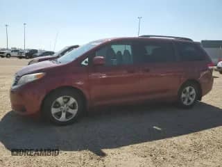 2012 Toyota Sienna with VIN 5TDZK3DCXCS189720, listed as a Copart auction lot 66879435 with 263,075 mi miles and Salvage title. Bid and sale history available at DreamBid. Image 1.