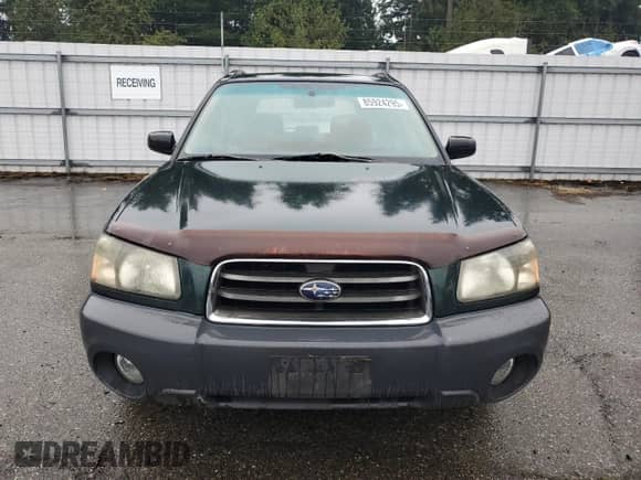 2004 Subaru Forester X with VIN JF1SG63694H753773, listed as a Copart auction lot 85924295 with 129,788 mi miles and Salvage title. Bid and sale history available at DreamBid. Image 5.