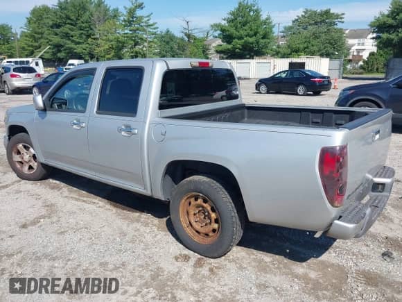 2010 Chevrolet Colorado 1LT z VIN 1GCDSCDE7A8140360, wystawiony jako IAAI lot #42660572 z przebiegiem 147 641 mil mil oraz . Historia ofert i sprzedaży dostępna na DreamBid. Obrazek 3.
