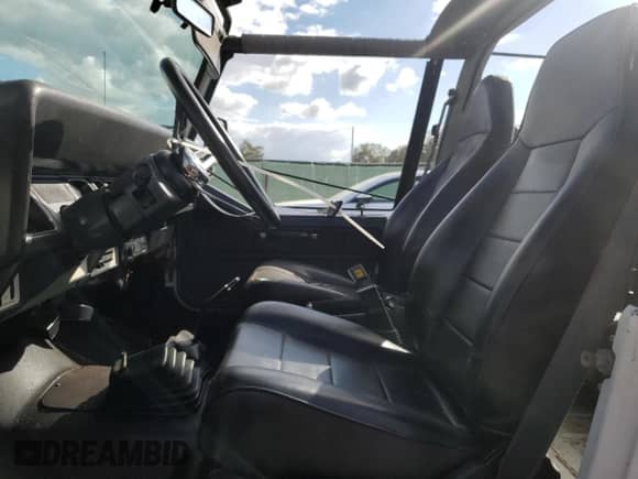 1991 Jeep Wrangler with VIN 2J4FY29P2MJ119803, listed as a Copart auction lot 79846984 with 155,204 mi miles and Salvage title. Bid and sale history available at DreamBid. Image 7.