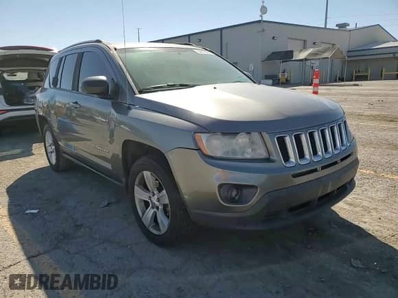 2012 Jeep Compass Sport z VIN 1C4NJCBA0CD618121, wystawiony jako Copart lot #84818275 z przebiegiem 170 126 mil mil oraz Szkoda całkowita • Salvage title. Historia ofert i sprzedaży dostępna na DreamBid. Obrazek 13.