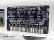 2015 Hyundai Santa Fe with VIN 5XYZTDLBXFG281813, listed as a IAAI auction lot 42885236 with 103,867 mi miles and . Bid and sale history available at DreamBid. Image 9.