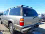 2003 Chevrolet Suburban Z71 with VIN 3GNFK16Z33G253479, listed as a IAAI auction lot 41871504 with 157,990 mi miles and . Bid and sale history available at DreamBid. Image 3.