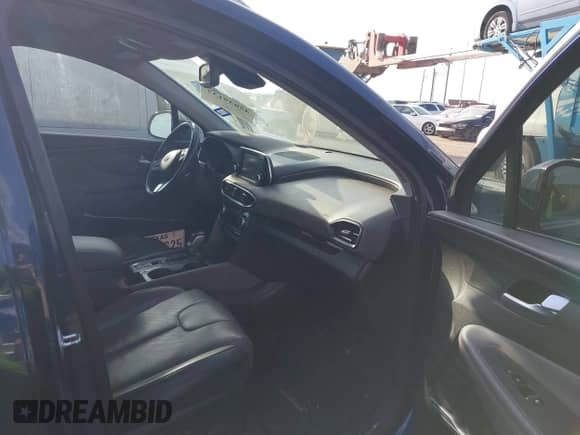 2020 Hyundai Santa Fe SEL with VIN 5NMS3CAA3LH285659, listed as a IAAI auction lot 42839132 with 99,410 mi miles and . Bid and sale history available at DreamBid. Image 5.