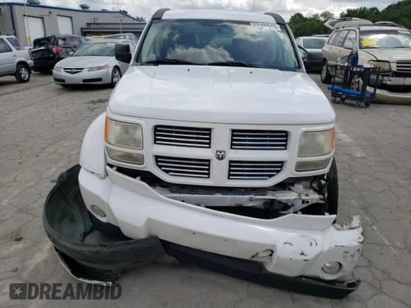2011 Dodge Nitro Heat z VIN 1D4PT4GK7BW585358, wystawiony jako Copart lot #70366934 z przebiegiem 180 997 mil mil oraz Szkoda całkowita • Salvage title. Historia ofert i sprzedaży dostępna na DreamBid. Obrazek 5.
