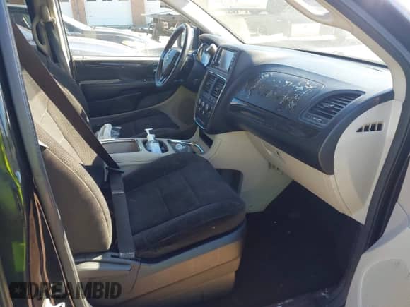 2014 Dodge Grand Caravan SXT with VIN 2C4RDGCG5ER122475, listed as a IAAI auction lot 43423105 with 189,985 mi miles and . Bid and sale history available at DreamBid. Image 5.