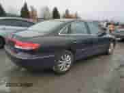 2006 Hyundai Azera SE z VIN KMHFC46F56A097392, wystawiony jako Copart lot #81001514 z przebiegiem 151 469 mil mil oraz Czysty tytuł • Clean title. Historia ofert i sprzedaży dostępna na DreamBid. Obrazek 3.