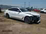 2023 BMW i4 M50 with VIN WBY33AW08PFP39835, listed as a Copart auction lot 63493225 with 27,661 mi miles and Salvage title. Bid and sale history available at DreamBid. Image 4.