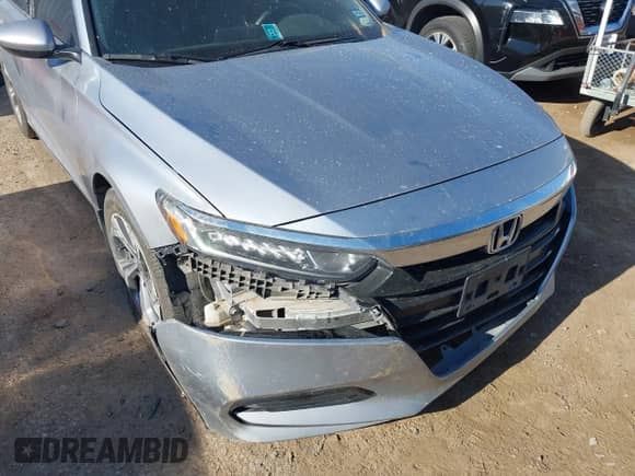 2018 Honda Accord EX-L with VIN 1HGCV1F54JA131856, listed as a IAAI auction lot 42892227 with 101,277 mi miles and . Bid and sale history available at DreamBid. Image 6.