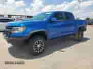 2020 Chevrolet Colorado 4WD ZR2 z VIN 1GCGTEEN6L1104160, wystawiony jako Copart lot #64774765 z przebiegiem 70 683 mil mil oraz Szkoda całkowita • Salvage title. Historia ofert i sprzedaży dostępna na DreamBid. Obrazek 1.