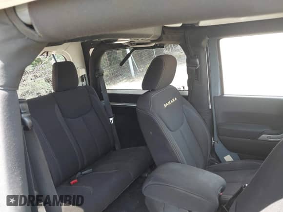 2014 Jeep Wrangler Sahara с VIN 1C4AJWBG5EL141201, выставлен на аукционе IAAI как лот 42873077 с пробегом 111 632 миль миль и . История ставок и продаж доступна на DreamBid. Изображение 8.