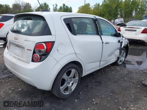 2015 Chevrolet Sonic LTZ with VIN 1G1JE6SB9F4193315, listed as a IAAI auction lot 43279436 with 100,413 mi miles and . Bid and sale history available at DreamBid. Image 4.