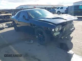 2017 Dodge Challenger SXT Plus z VIN 2C3CDZAG6HH666289, wystawiony jako IAAI lot #43390493 z przebiegiem 148 510 mil mil oraz . Historia ofert i sprzedaży dostępna na DreamBid. Obrazek 1.