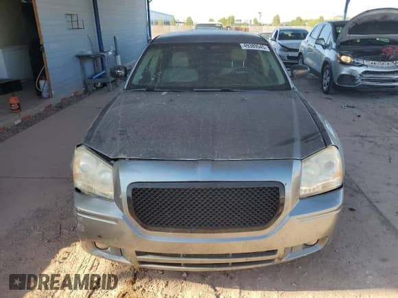 2007 Dodge Magnum R/T z VIN 2D4GV57257H656658, wystawiony jako Copart lot #49389545 z przebiegiem 221 395 mil mil oraz Szkoda całkowita • Salvage title. Historia ofert i sprzedaży dostępna na DreamBid. Obrazek 5.