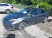 2019 Toyota Corolla L with VIN 5YFBURHE3KP901065, listed as a IAAI auction lot 43209887 with 163,304 mi miles and . Bid and sale history available at DreamBid. Image 2.