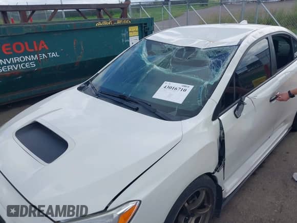 2016 Subaru WRX with VIN JF1VA1B61G9815345, listed as a IAAI auction lot 43016710 with 92,225 mi miles and . Bid and sale history available at DreamBid. Image 6.