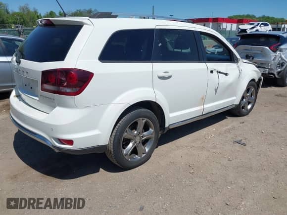 2016 Dodge Journey Crossroad Plus with VIN 3C4PDCGG4GT154134, listed as a IAAI auction lot 42124659 with 101,700 mi miles and . Bid and sale history available at DreamBid. Image 4.