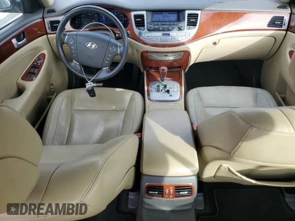 2012 Hyundai Genesis 3.8L z VIN KMHGC4DD1CU205264, wystawiony jako Copart lot #85598175 z przebiegiem 154 917 mil mil oraz Szkoda całkowita • Salvage title. Historia ofert i sprzedaży dostępna na DreamBid. Obrazek 8.