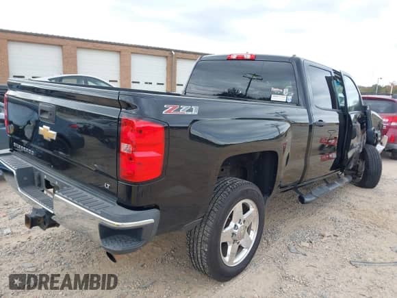 2015 Chevrolet Silverado 2500HD LT with VIN 1GC1KVEG9FF152026, listed as a IAAI auction lot 43427334 with 214,348 mi miles and . Bid and sale history available at DreamBid. Image 4.
