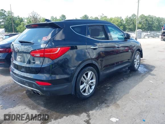 2015 Hyundai Santa Fe with VIN 5XYZW4LA4FG245064, listed as a IAAI auction lot 42728103 with 199,284 mi miles and . Bid and sale history available at DreamBid. Image 4.