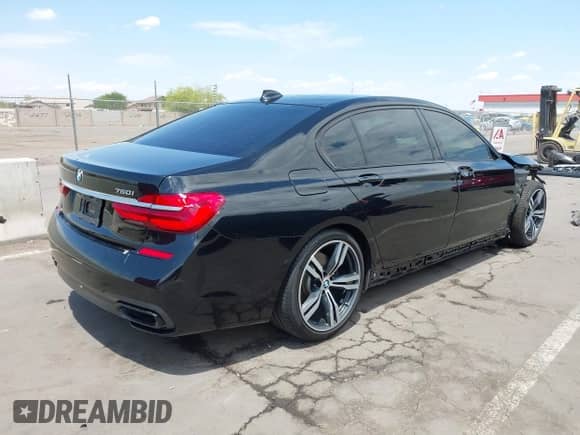 2018 BMW 7 Series 750i с VIN WBA7F0C59JGM23332, выставлен на аукционе IAAI как лот 42215338 с пробегом 61 911 миль миль и . История ставок и продаж доступна на DreamBid. Изображение 4.
