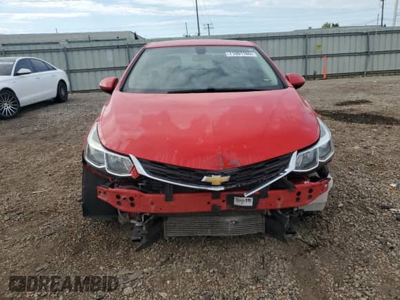 2018 Chevrolet Cruze LS z VIN 1G1BC5SM5J7150717, wystawiony jako Copart lot #71001165 z przebiegiem 158 899 mil mil oraz Szkoda całkowita • Salvage title. Historia ofert i sprzedaży dostępna na DreamBid. Obrazek 5.