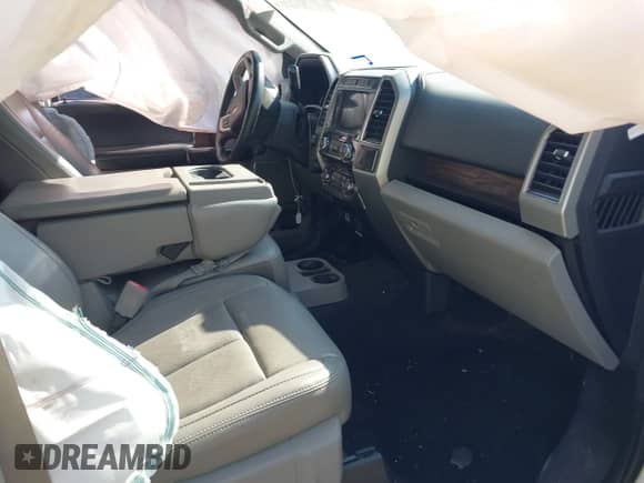 2018 Ford F-150 XL z VIN 1FTFW1EG0JKC58870, wystawiony jako IAAI lot #43209369 z przebiegiem 122 374 mil mil oraz . Historia ofert i sprzedaży dostępna na DreamBid. Obrazek 5.