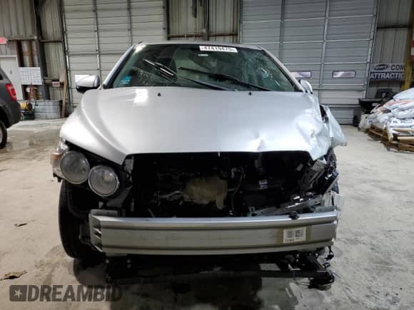 2013 Chevrolet Sonic LTZ with VIN 1G1JE5SH6D4102528, listed as a Copart auction lot 47419475 with 129,812 mi miles and Salvage title. Bid and sale history available at DreamBid. Image 5.