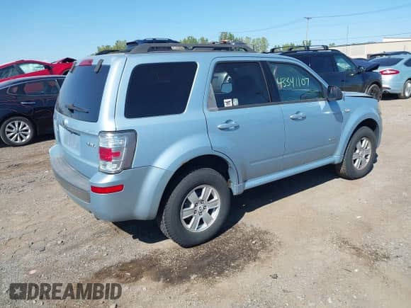 2008 Mercury Mariner with VIN 4M2CU91198KJ24730, listed as a IAAI auction lot 43341107 with 158,521 mi miles and . Bid and sale history available at DreamBid. Image 4.