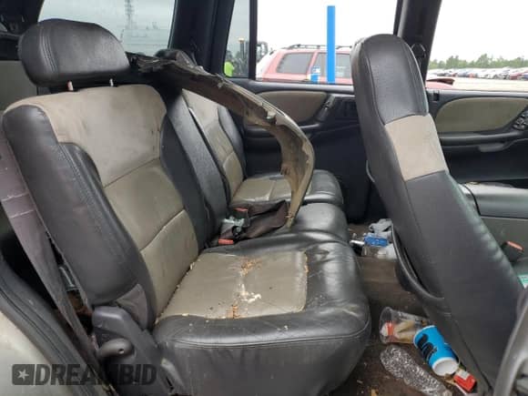 2000 Dodge Durango z VIN 1B4HS28Z3YF297430, wystawiony jako Copart lot #69311225 z przebiegiem 229 826 mil mil oraz Szkoda całkowita • Salvage title. Historia ofert i sprzedaży dostępna na DreamBid. Obrazek 11.
