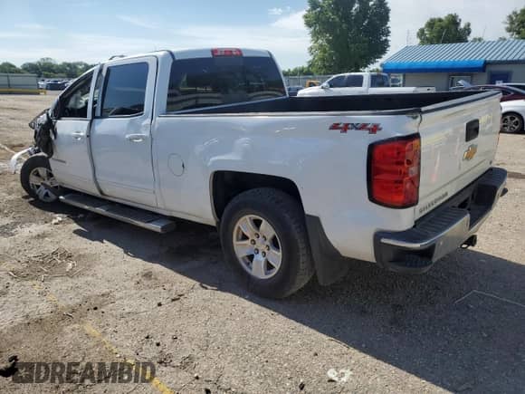 2015 Chevrolet Silverado 1500 LT with VIN 3GCUKREH4FG351948, listed as a Copart auction lot 63574475 with Not provided miles and Salvage title. Bid and sale history available at DreamBid. Image 2.