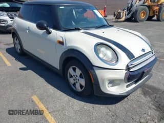 2014 MINI Hardtop with VIN WMWXM5C56ET933847, listed as a IAAI auction lot 43107209 with 148,111 mi miles and . Bid and sale history available at DreamBid. Image 1.