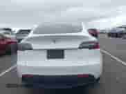 2022 Tesla Model Y Long Range z VIN 7SAYGDEE6NF317707, wystawiony jako IAAI lot #43186532 z przebiegiem 45 306 mil mil oraz . Historia ofert i sprzedaży dostępna na DreamBid. Obrazek 17.