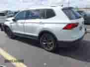 2022 Volkswagen Tiguan SE with VIN 3VV3B7AX1NM042582, listed as a IAAI auction lot 43073057 with 28,724 mi miles and . Bid and sale history available at DreamBid. Image 3.