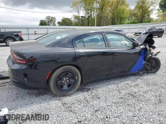 2023 Dodge Charger Police z VIN 2C3CDXAT4PH643318, wystawiony jako Copart lot #51910875 z przebiegiem Nie podano mil oraz Szkoda całkowita • Salvage title. Historia ofert i sprzedaży dostępna na DreamBid. Obrazek 3.
