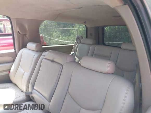 2003 Chevrolet Suburban LT with VIN 1GNEC16Z83J191651, listed as a IAAI auction lot 42309641 with Not provided miles and . Bid and sale history available at DreamBid. Image 12.