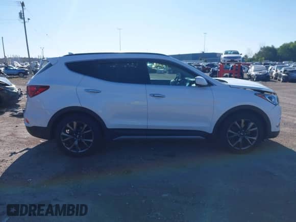 2018 Hyundai Santa Fe Ultimate with VIN 5NMZWDLA2JH105416, listed as a IAAI auction lot 43062661 with 67,574 mi miles and . Bid and sale history available at DreamBid. Image 13.