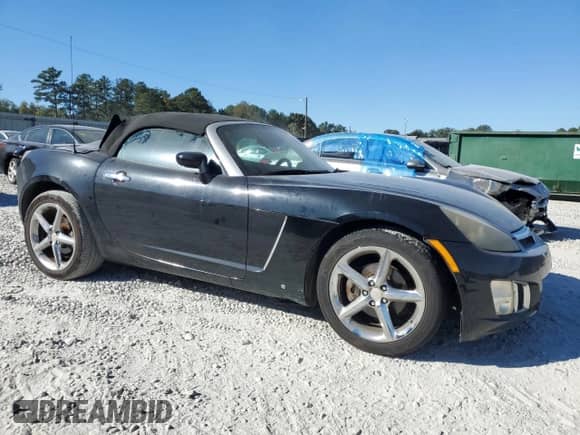 2008 Saturn Sky Red Line with VIN 1G8MF35X88Y123172, listed as a Copart auction lot 77130844 with 164,676 mi miles and Clean title. Bid and sale history available at DreamBid. Image 4.